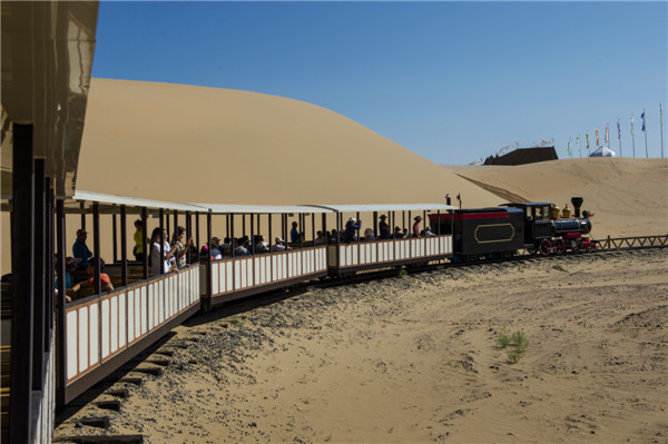 响沙湾,沙漠,度假地,景区,旅游,图片,照片,摄影,内蒙古响沙湾,内蒙古旅游,鄂尔多斯市旅游,莲花酒店,莲花度假酒店,莲沙度假岛,福沙度假岛,悦沙休闲岛,仙沙休闲岛,一粒沙度假村,在线预订,预定,旅行社,AAAAA,5A级旅游景区,库布齐,库布其沙漠,库布其旅游